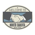 Business concept with handshake and the text Welcome to North Da