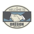 Business concept with handshake and the text Welcome to Oregon,