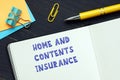 Business concept about HOME AND CONTENTS INSURANCE with inscription on the financial document Royalty Free Stock Photo