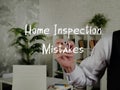 Business concept about Home Inspection Mistakes with phrase on the piece of paper Royalty Free Stock Photo