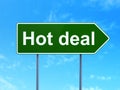 Business concept: Hot Deal on road sign background Royalty Free Stock Photo