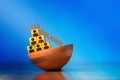 Business concept for human resource management and recruitment. Pyramid of wooden cubes with the image of little men. A copy of