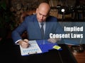 Business concept about Implied Consent Laws . Closeup portrait of unrecognizable successful businessman wearing formal suit
