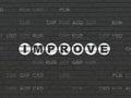 Business concept: Improve on wall background Royalty Free Stock Photo