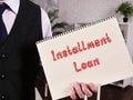 Business concept about Installment Loan with sign on the page