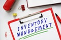 Business concept about INVENTORY MANAGEMENT with phrase on the sheet Royalty Free Stock Photo