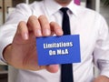 Business concept about Limitations On M&A with inscription on the page