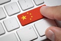 China flag enter key on metallic keyboard Royalty Free Stock Photo