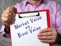 Business concept about Market Value vs. Book Value with phrase on the sheet