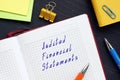 Business concept meaning Audited Financial Statements with inscription on the sheet