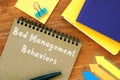 Business concept meaning Bad Management Behaviors with phrase on the piece of paper