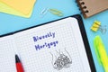 Business concept meaning Biweekly Mortgage with sign on the page