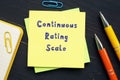 Business concept meaning Continuous Rating Scale with sign on the sheet