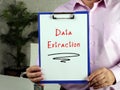 Business concept meaning Data Extraction with inscription on the sheet