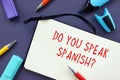 Business Concept Meaning Do You Speak Spanish? With Sign On The Page