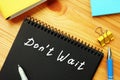 Business concept meaning Don`t Wait  with phrase on the page Royalty Free Stock Photo