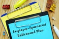 Business concept meaning Employer-Sponsored Retirement Plan with sign on the sheet