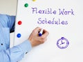 Business concept meaning Flexible Work Schedules with sign on the piece of paper