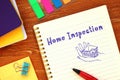 Business concept meaning Home Inspection with inscription on the piece of paper Royalty Free Stock Photo