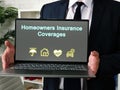 Business concept meaning Homeowners Insurance Coverages with sign on the sheet
