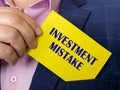 Business concept meaning INVESTMENT MISTAKE with inscription on the sheet Royalty Free Stock Photo