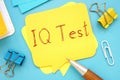 Business concept meaning Iq Test with sign on the page