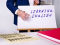 Business concept meaning LEARNING ENGLISH with inscription on the sheet Royalty Free Stock Photo