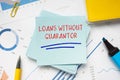 Business concept meaning LOANS WITHOUT GUARANTOR with inscription on the page