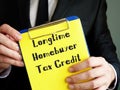 Business concept meaning Longtime Homebuyer Tax Credit with inscription on the page
