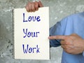 Business concept meaning Love Your Work with sign on the piece of paper Royalty Free Stock Photo