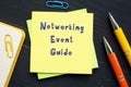 Business concept meaning Networking Event Guide with sign on the sheet