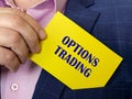 Business concept meaning OPTIONS TRADING with inscription on the sheet Royalty Free Stock Photo