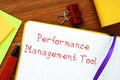 Business concept meaning Performance Management Tool with inscription on the page