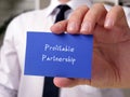 Business concept meaning Profitable Partnership with inscription on the piece of paper Royalty Free Stock Photo