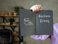 Business concept meaning Reckless Driving with phrase on the piece of paper Royalty Free Stock Photo