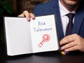 Business concept meaning Risk Tolerance with inscription on blank notepad