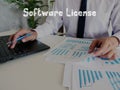 Business concept meaning Software License with phrase on the sheet