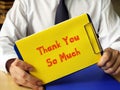 Business concept meaning Thank You So Much with phrase on the piece of paper