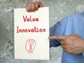 Business concept meaning Value Innovation with phrase on the piece of paper Royalty Free Stock Photo