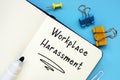 Business concept meaning Workplace Harassment with phrase on the page