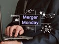 Business concept about Merger Monday with inscription on the page