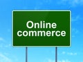 Business concept: Online Commerce on road sign background Royalty Free Stock Photo