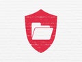 Business concept: Folder With Shield on wall background Royalty Free Stock Photo