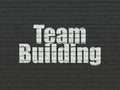 Business concept: Team Building on wall background Royalty Free Stock Photo