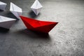 Business Concept, Paper Boat, the key opinion Leader, the concept of influence. Royalty Free Stock Photo