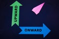 Business concept with paper plane and colored arrows on dark blue background. Upward, onward. Royalty Free Stock Photo