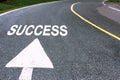 Business concept picture of success and road arrow direction sign on the asphalt road Royalty Free Stock Photo