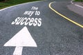 business concept picture of way to successful and road arrow direction sign on the asphalt road Royalty Free Stock Photo