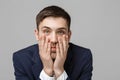 Business Concept - Portrait handsome handsome business man in suit smiling and siting in work office with serious and depressed ex Royalty Free Stock Photo