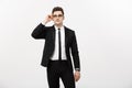 Business Concept: Portrait handsome young businessman wearing glasses isolated over white background Royalty Free Stock Photo